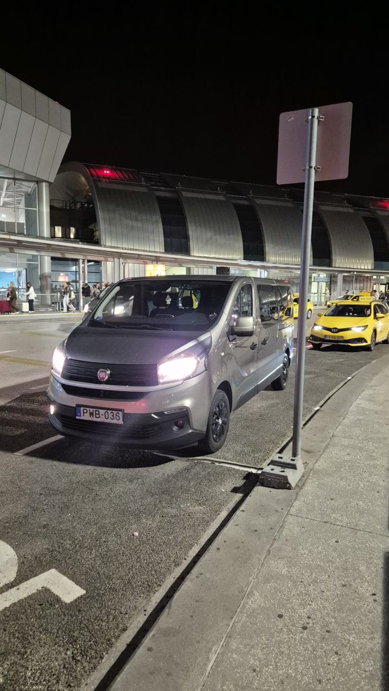 ECO BUD minibus at Terminal 2 at night